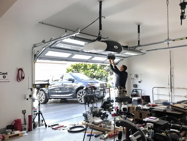 Fountainebleau Garage Door Repair specialist installing smart garage door opener system in Fountainebleau home