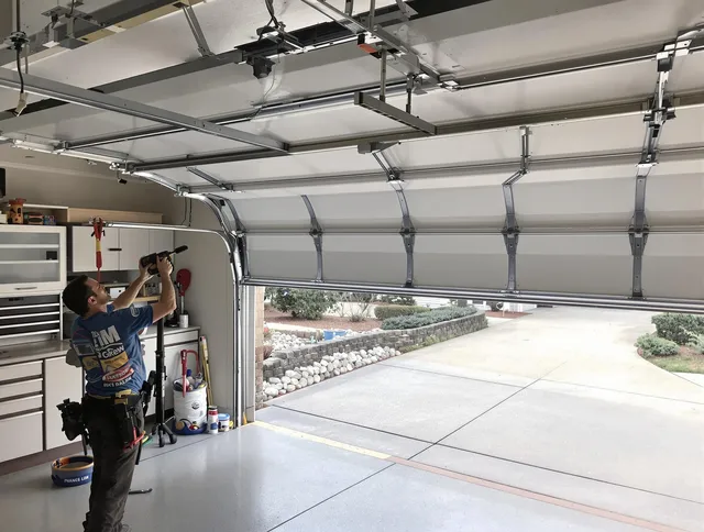 Garage door track repair service by Fountainebleau Garage Door Repair in Fountainebleau
